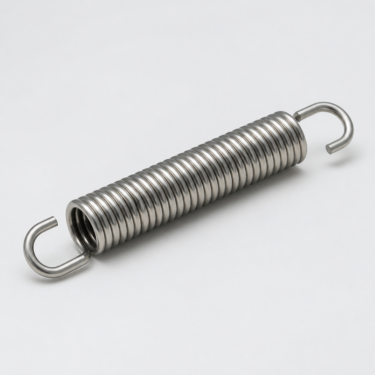 Stainless steel tension spring with formed hooks for industrial applications